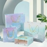  [GIAO HÀNG 7-25 NGÀY] COMBO 100 Túi giấy quai xách họa tiết hoa lá màu hồng,xanh pastel đính kèm ruy băng nơ Q1888 
