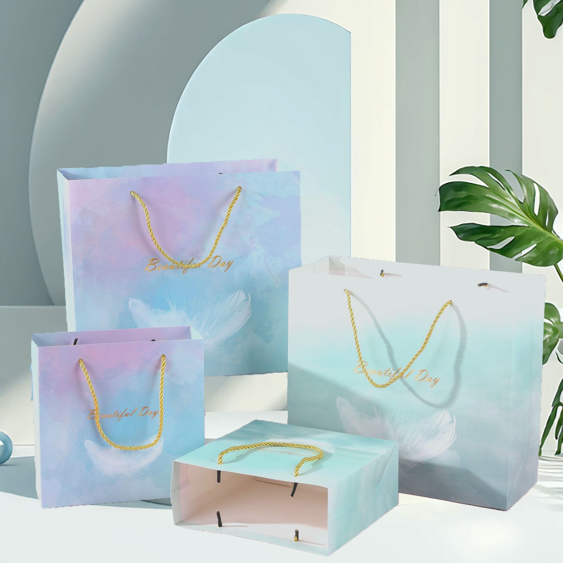  [GIAO HÀNG 7-25 NGÀY] COMBO 100 Túi giấy quai xách họa tiết hoa lá màu hồng,xanh pastel đính kèm ruy băng nơ Q1888 