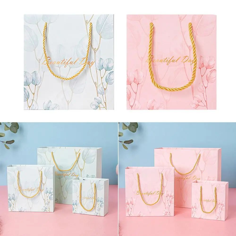  [GIAO HÀNG 7-25 NGÀY] COMBO 100 Túi giấy quai xách họa tiết hoa lá màu hồng,xanh pastel đính kèm ruy băng nơ Q1888 