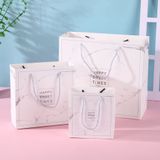  [GIAO HÀNG 7-25 NGÀY] COMBO 100 Túi giấy quai xách họa tiết hoa lá màu hồng,xanh pastel đính kèm ruy băng nơ Q1888 