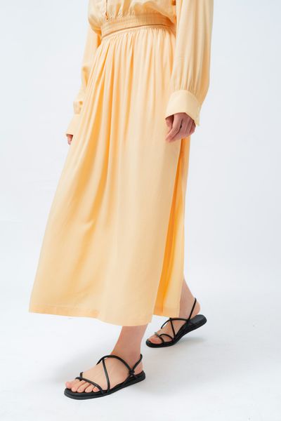  Chân váy xòe dáng dài xẻ gấu 