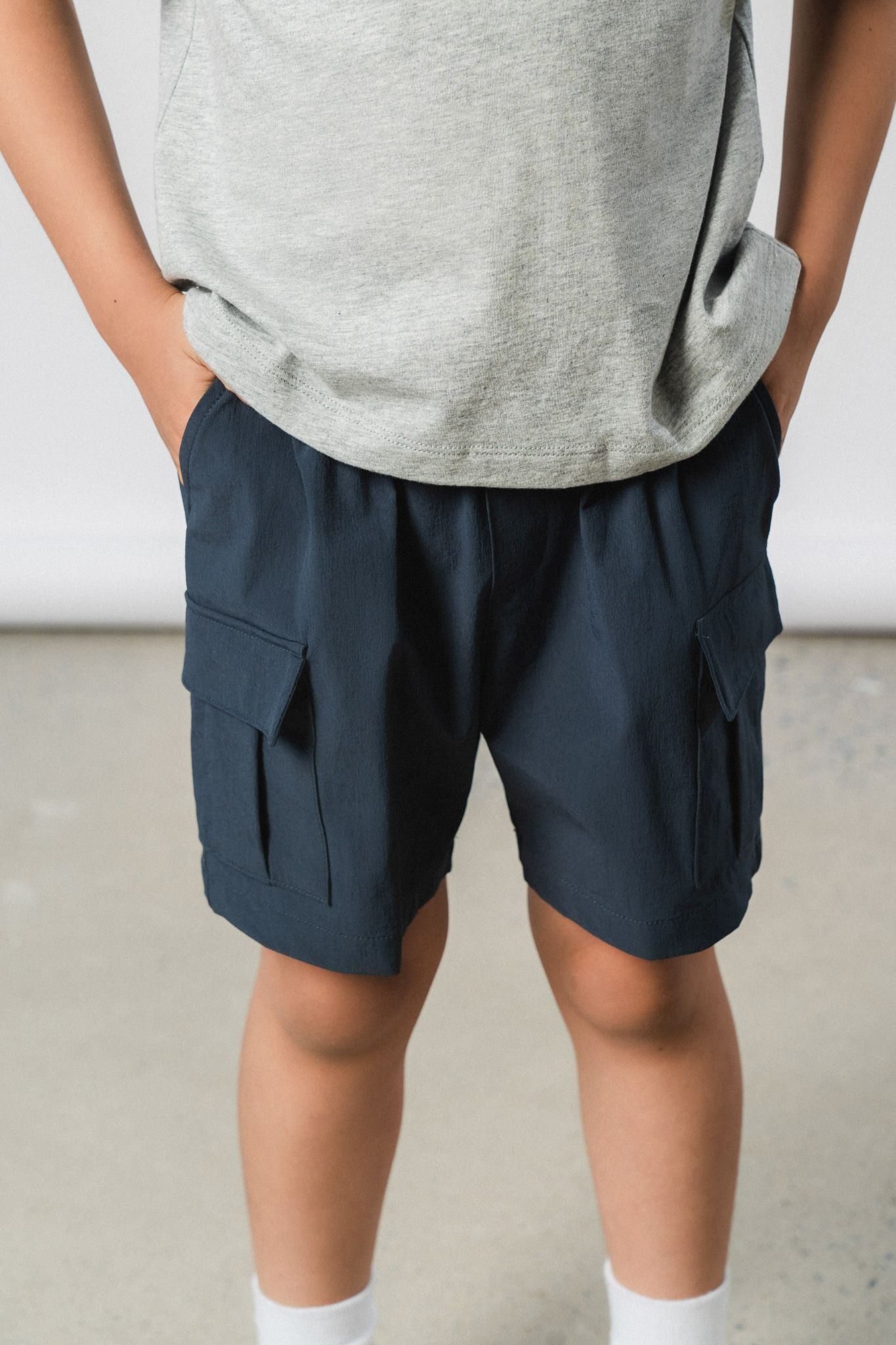  Quần shorts túi hộp bé trai vải gió 