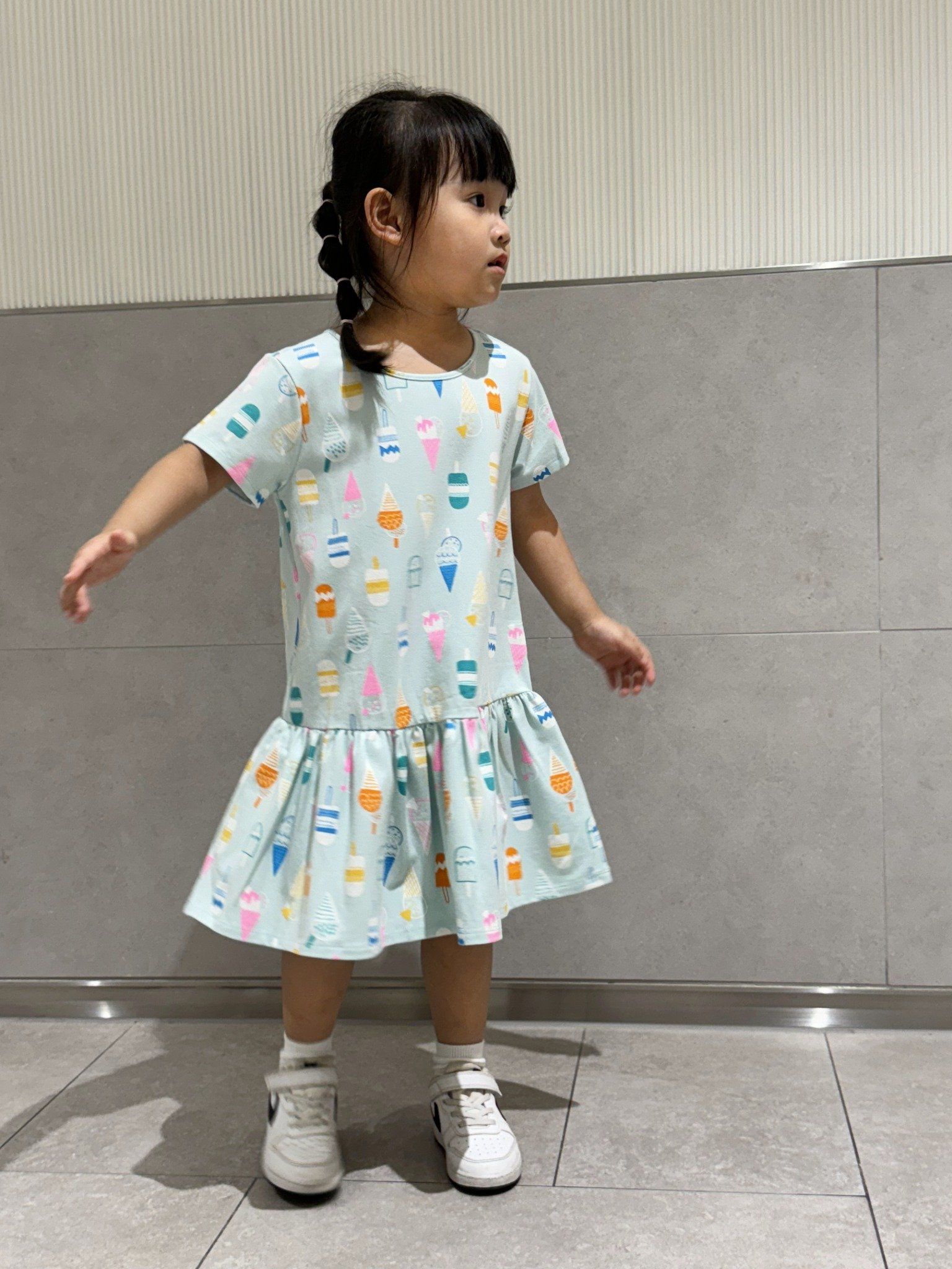  Đầm thun ngắn tay bé gái in hoạ tiết kiểu peplum 