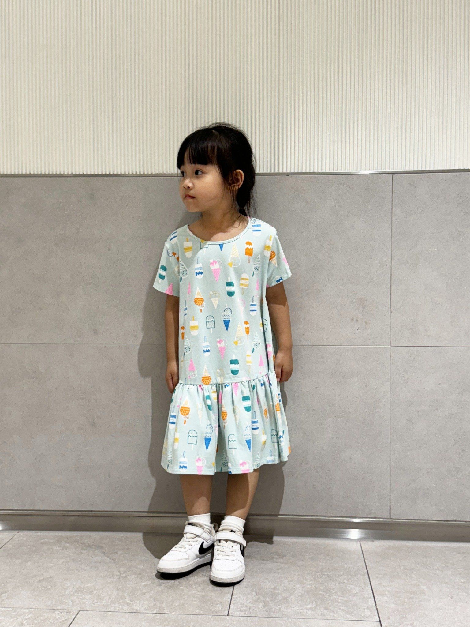  Đầm thun ngắn tay bé gái in hoạ tiết kiểu peplum 