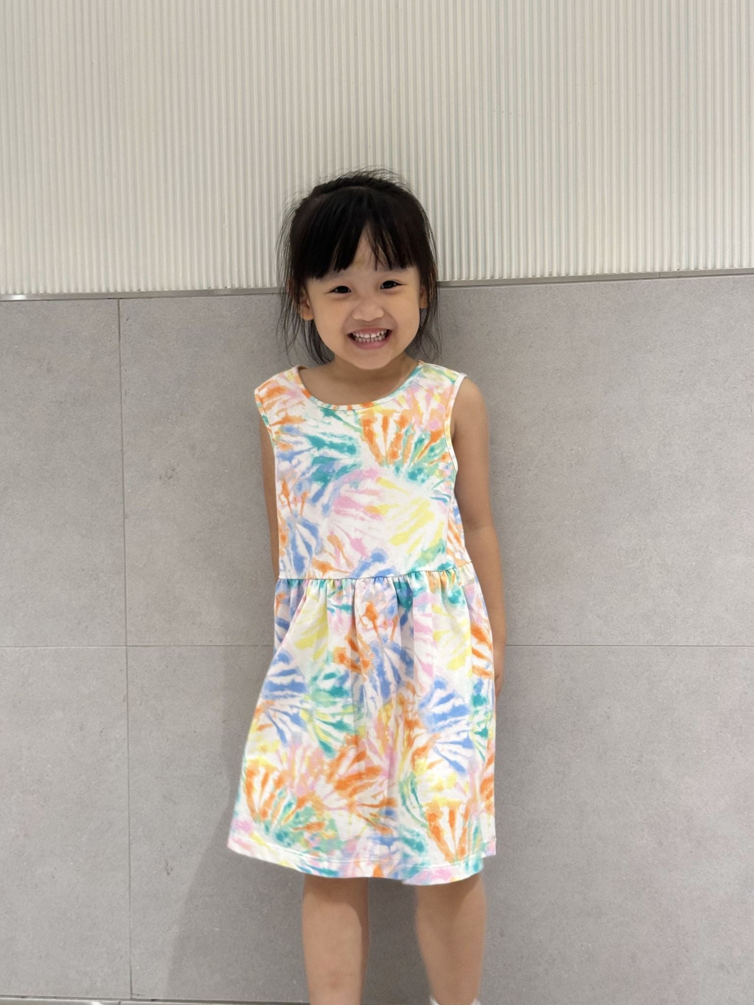  Đầm thun sát nách bé gái in hoạ tiết 