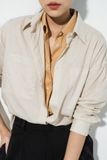  Áo sơ mi nữ dáng rộng túi ngực tối giản 
