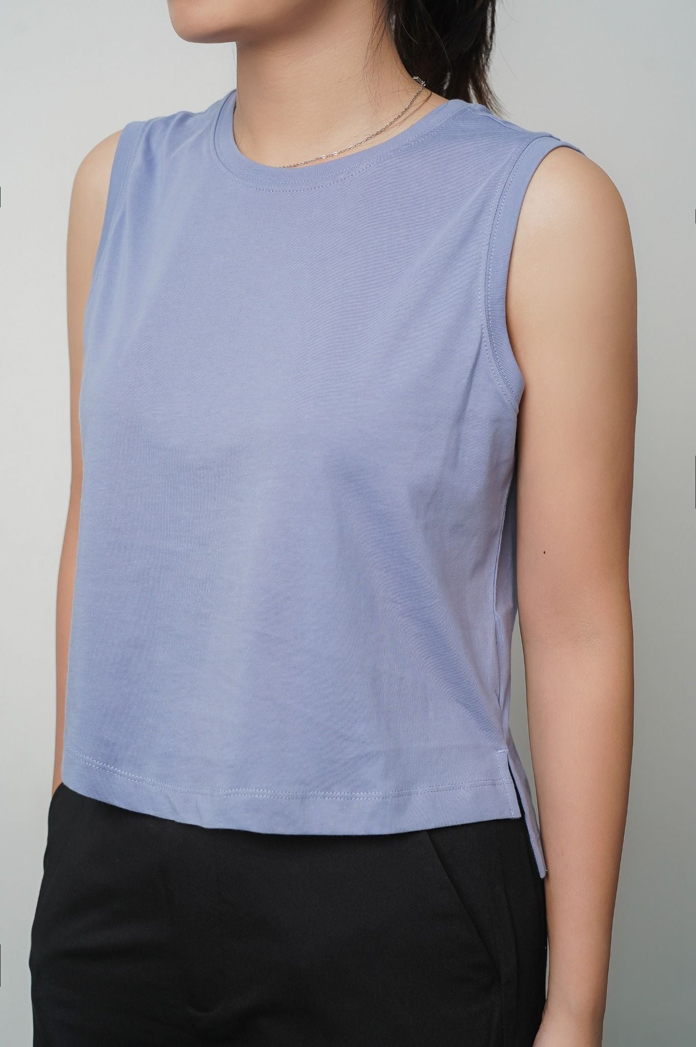  Áo nữ không tay gấu cao thấp 