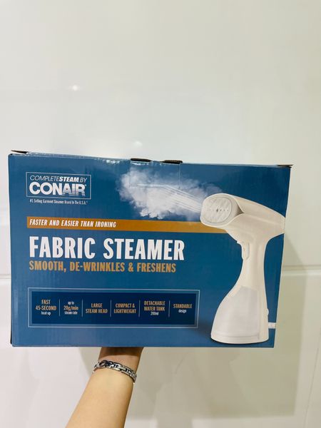 ban-ui-hoi-nuoc-cam-tay-conair-handheld-diet-khuan-tren-vai-1200w