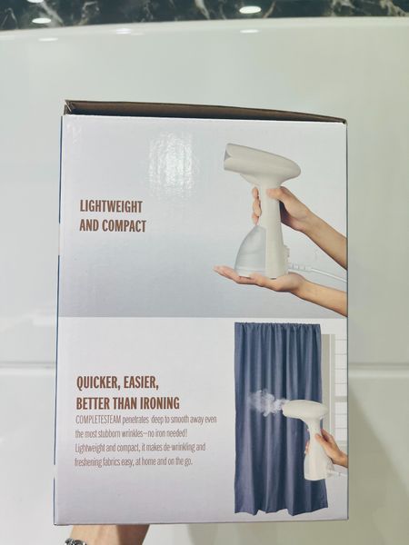 ban-ui-hoi-nuoc-cam-tay-conair-handheld-diet-khuan-tren-vai-1200w