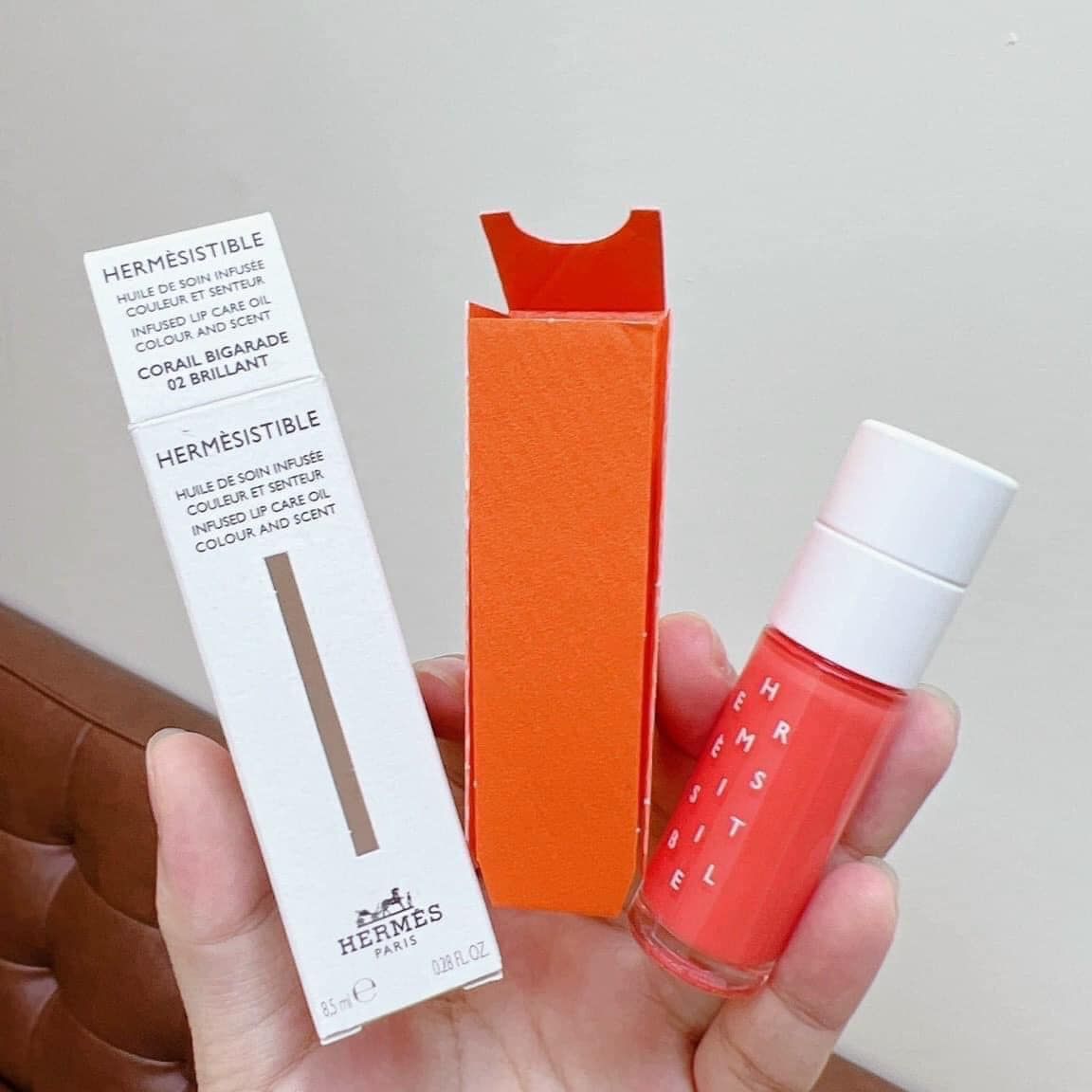  Son Dưỡng Hermès Hermesistible Infused Lip Care Oils 02 Corail Bigarade - Cam San Hô 