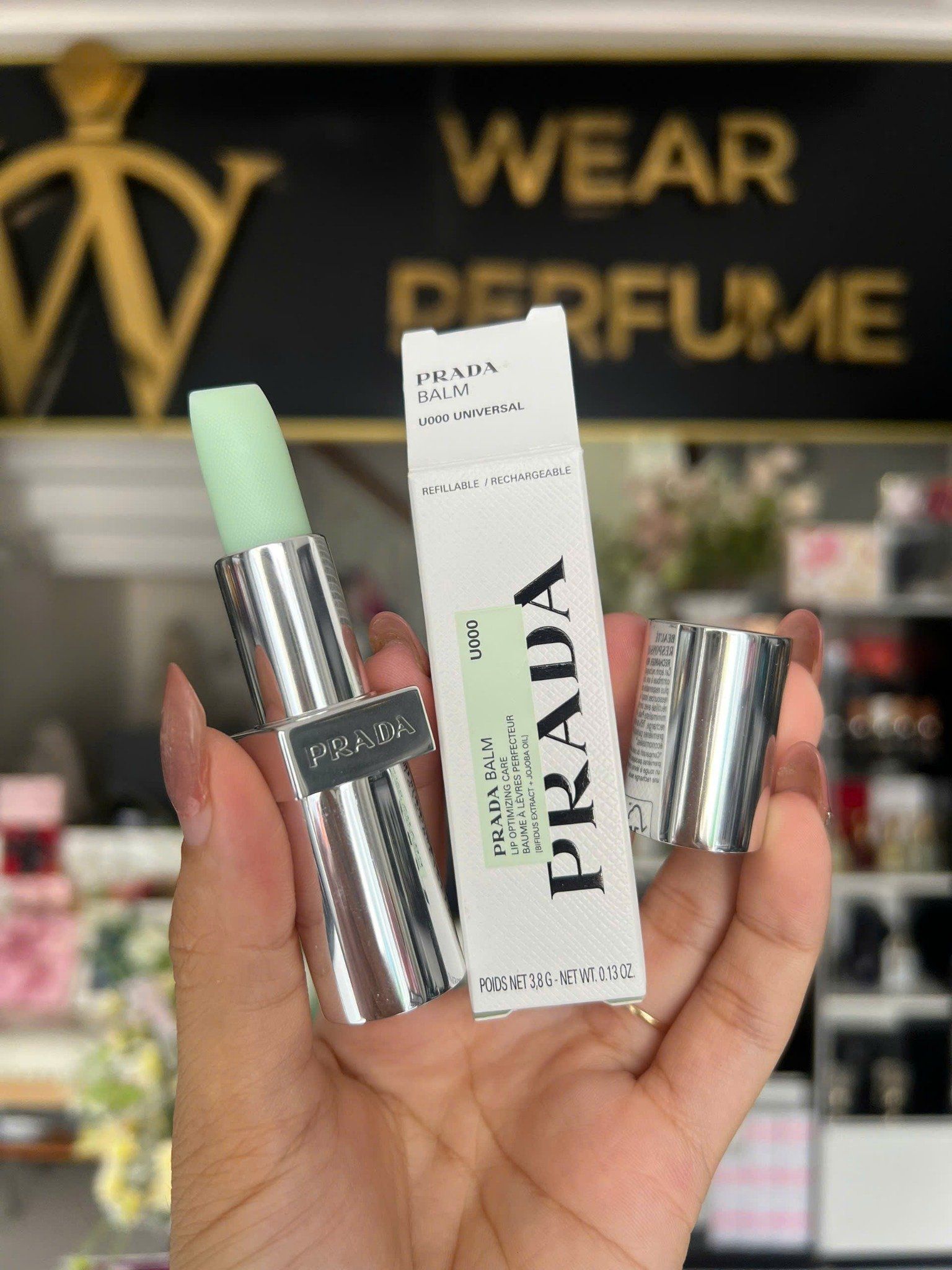  Son Dưỡng Prada Beauty Moisturizing Lip Balm U000 Universal 3.8g – Không Màu 
