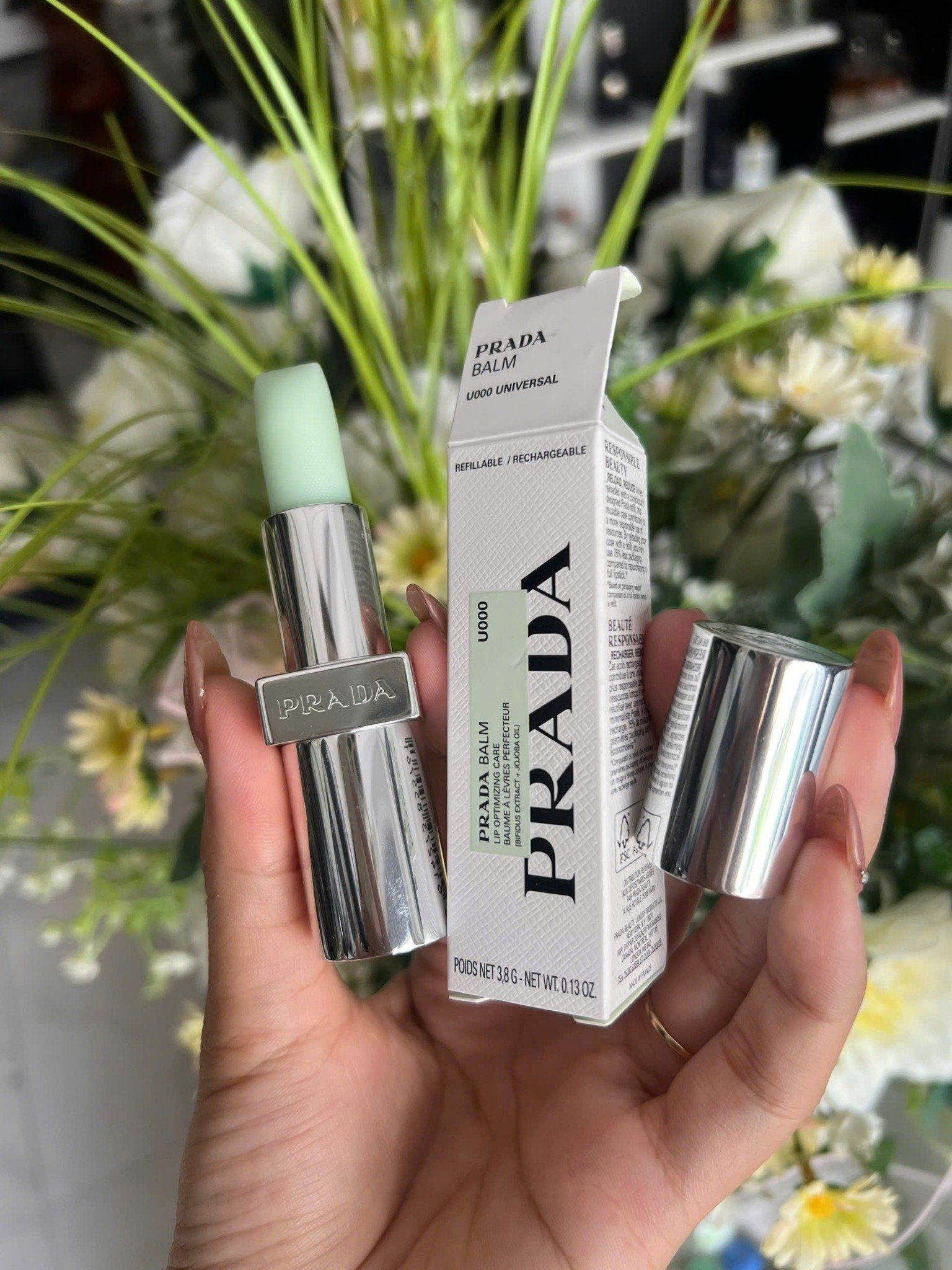  Son Dưỡng Prada Beauty Moisturizing Lip Balm U000 Universal 3.8g – Không Màu 