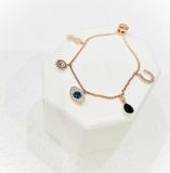  Lắc tay Swarovski charm Evil eye - Swarovski Symbolic bracelet Infinity, evil eye and horseshoe, Blue, Rose gold-tone plated 