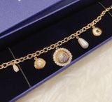  Lắc thiên nga gold charm Swarovski - Swarovski Vintage Swan Gold Tone Dark Multi Colored Crystal Bracelet 