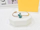  Lắc tay Swarovski thiên nga tung cánh new màu xanh lá - Swarovski Iconic Swan bangle Swan, Green, Rose gold-tone plated 