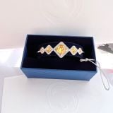  Lắc cứng Swarovski màu amber - Swarovski Carina Sunflower Amber Crystal Rhodium Plated Bangle 