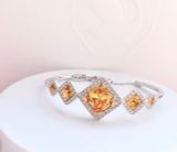  Lắc cứng Swarovski màu amber - Swarovski Carina Sunflower Amber Crystal Rhodium Plated Bangle 