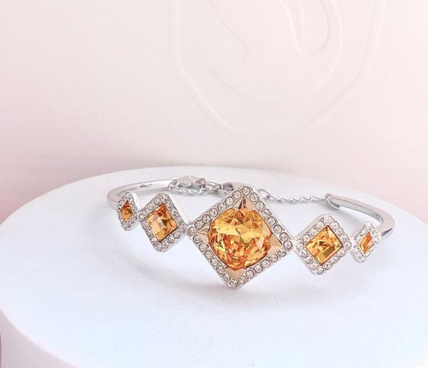  Lắc cứng Swarovski màu amber - Swarovski Carina Sunflower Amber Crystal Rhodium Plated Bangle 