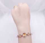  Lắc cứng Swarovski màu amber - Swarovski Carina Sunflower Amber Crystal Rhodium Plated Bangle 