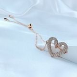  Lắc tay thiên nga chụm đầu Swarovski màu vàng hồng - Swarovski Una bracelet Heart, Medium, White, Rose gold-tone plated 