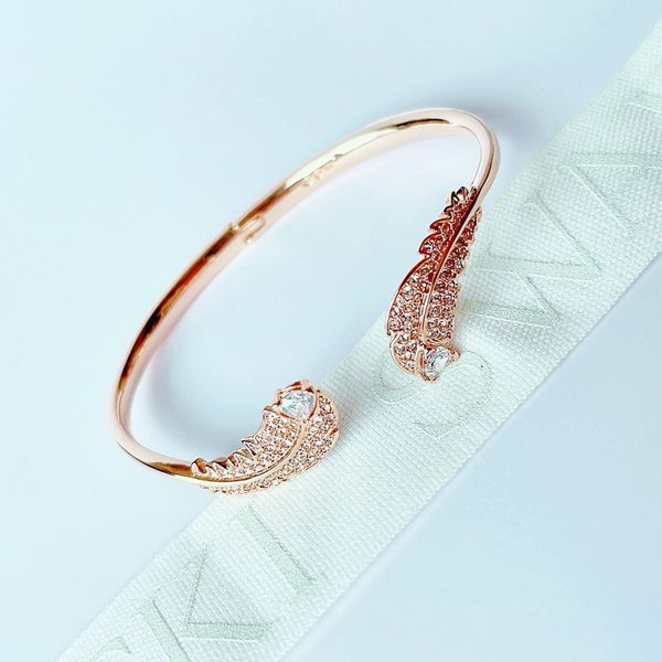  Vòng tay Swarovski Nice lông vũ màu vàng hồng size S - Swarovski Nice bangle Feather, White, Rose gold-tone plated, Size S 