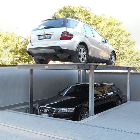 Thang đỗ xe âm sàn nhiều tầng động cơ kéo xích