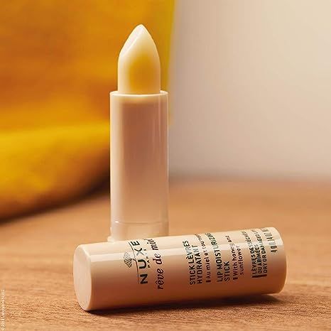 Son dưỡng  Nuxe reve de miel lip Moisturising Stick 4g son dưỡng không màu