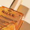 Dầu khô nhũ Nuxe huile prodigieuse OR shimmer dry oil 100ml