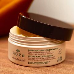 Dầu dưỡng thể mật ong tan chảy Nuxe Reve De Miel Honey body oil balm