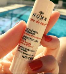Son dưỡng  Nuxe reve de miel lip Moisturising Stick 4g son dưỡng không màu