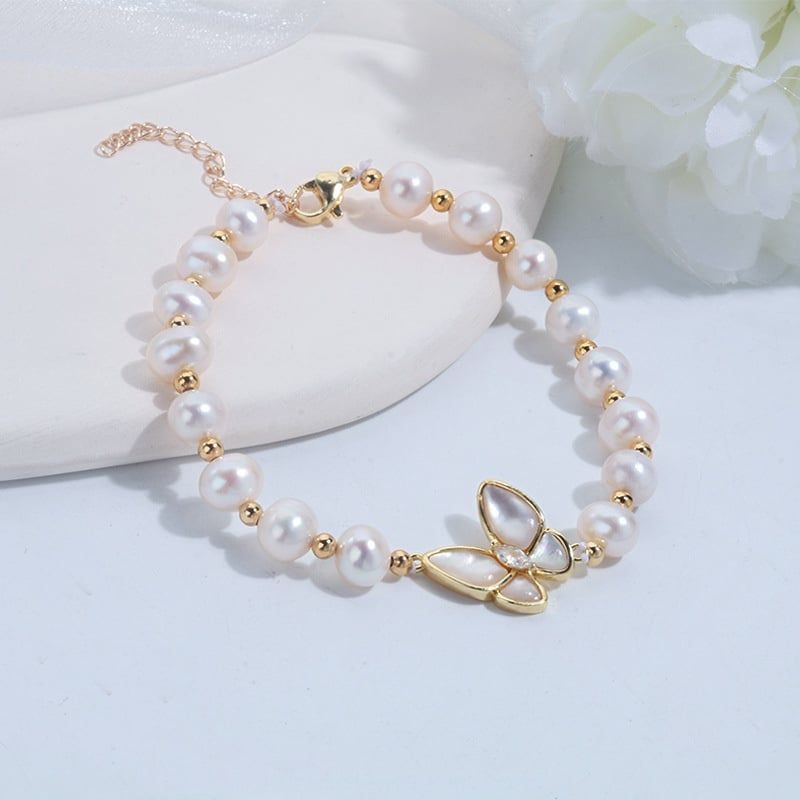 Vòng Tay Hình Bướm Ốp Vỏ Sò Xà Cừ Đính Ngọc Trai Tự Nhiên Sang Trọng VTT007