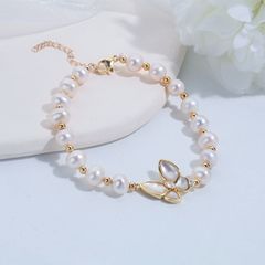 Vòng Tay Hình Bướm Ốp Vỏ Sò Xà Cừ Đính Ngọc Trai Tự Nhiên Sang Trọng VTT007