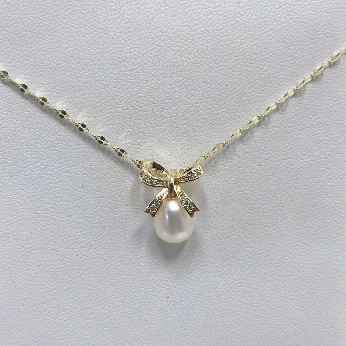 Mặt Dây Chuyền Ngọc Trai Giọt Nước Tự Nhiên Mặt Nơ Đính Đá Zircon MADAME HIEN PEARLS Đơn Giản MG031