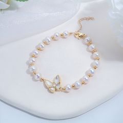 Vòng Tay Hình Bướm Ốp Vỏ Sò Xà Cừ Đính Ngọc Trai Tự Nhiên Sang Trọng VTT007