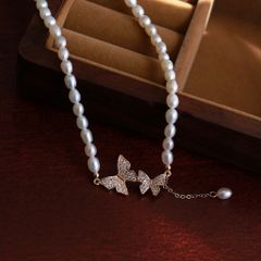 Vòng cổ Ngọc Trai Nuôi Hạt Gạo Tự Nhiên Choker Hình Nơ Bướm 5-6mm CG003