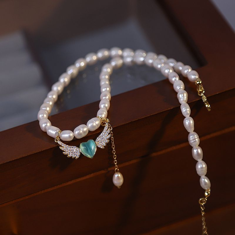 Vòng cổ Choker Ngọc Trai Tự Nhiên Khoá Tim Cánh Thiên Thần MADAME HIEN PEARLS CG020
