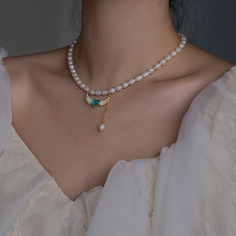 Vòng cổ Choker Ngọc Trai Tự Nhiên Khoá Tim Cánh Thiên Thần MADAME HIEN PEARLS