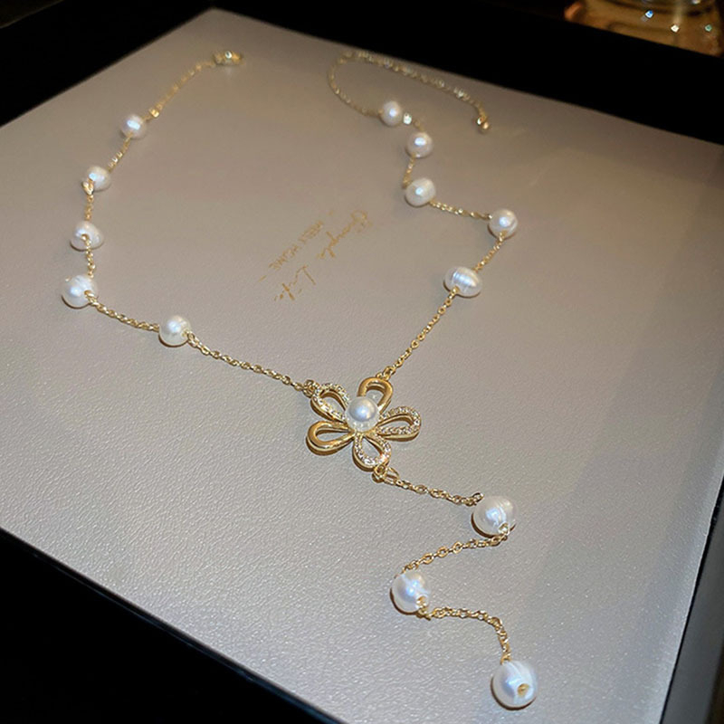 Vòng Cổ Dây Chuyền Điểm Hạt Ngọc Trai Tự Nhiên Mặt Hoa 5 Cánh Nối Tua Rua Dài Sành Điệu MADAME HIEN PEARLS Cho Nữ CT067