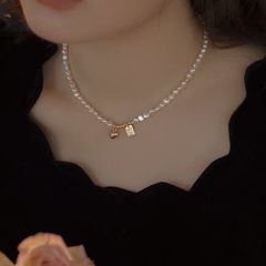 Bộ Vòng Cổ Và Vòng Tay Ngọc Trai Baroque Tự Nhiên Mặt Tua Rua Trái Tim và Tấm Thẻ Good Luck MADAME HIEN PEARLS Unisex Nam Nữ SCB008
