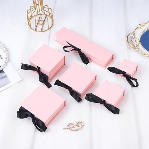 Hộp giấy 2 lớp trang sức hồng pastel có nơ sang trọng 7*7*3,5