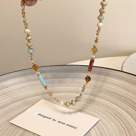 Vòng Tay Thủy Tinh Hạt Gạo Đính Ngọc Trai Tự Nhiên Niche Phong Cách Dân Tộc MADAME HIEN PEARLS VTG029