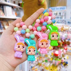 ** Móc khóa chuỗi ngọc trai cô gái