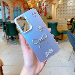 ** Ốp SS A56 lưng nhám nơ bạc Smile sao thổ