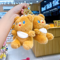 ** Móc khóa Gấu nâu túi vàng