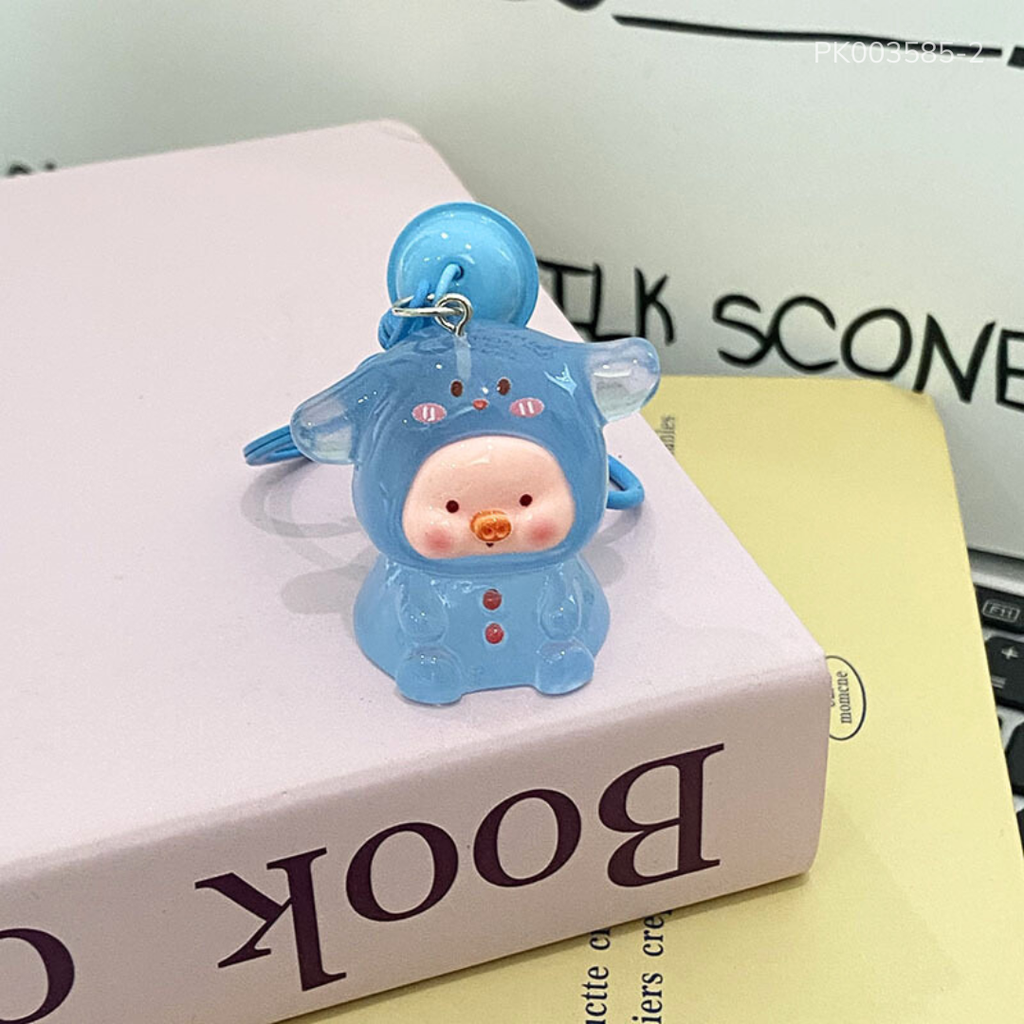 ** Móc khóa Charm Heo màu trong