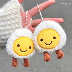 ** Móc khóa trứng chân nâu