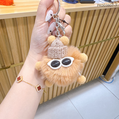 Móc khóa bông đội nón len đeo kính