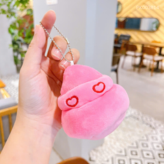 ** Móc khóa bông kem mắt trái tim hồng