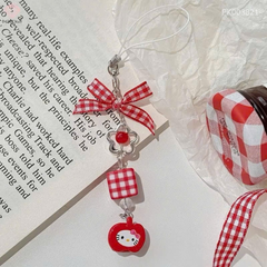 ** Dây đeo điện thoại mặt Kitty nơ đỏ sọc caro