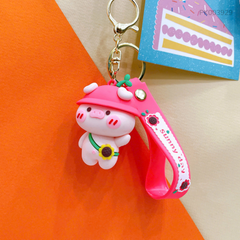 ** Móc khóa heo hồng đeo cặp hướng dương